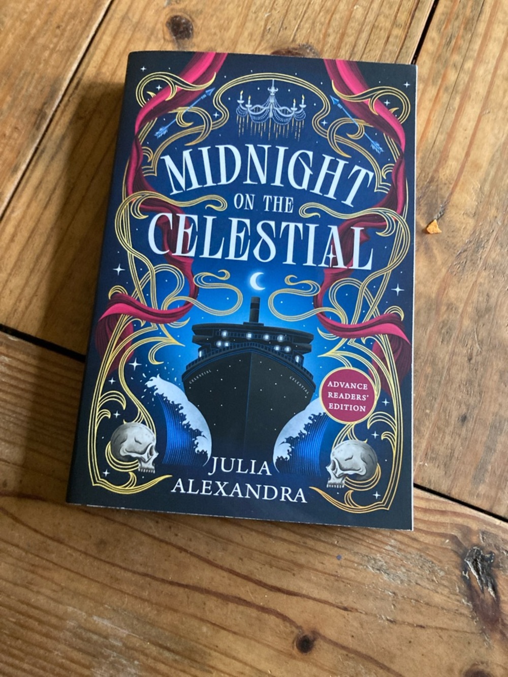 Midnight on the celestial. ARC. Navy Paperback Back Cover with Gold Text